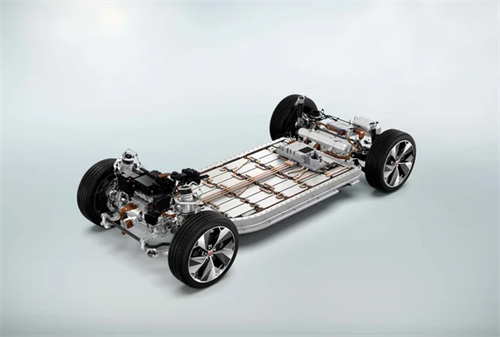 An electric vehicle skateboard chassis showing the large integrated battery pack, representing how safety redundancy is built into modern EV designs