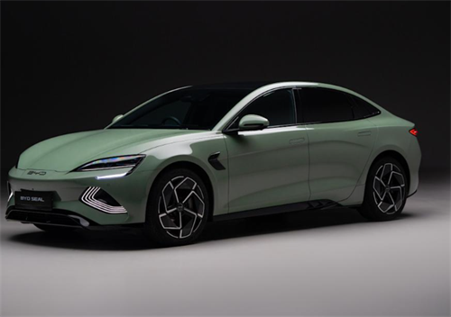 A light green BYD Seal sedan, representing Chinese EV new forces' rapid development of cost-effective driver assistance systems.